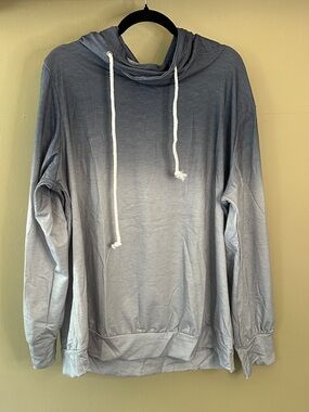 Women’s lounge hooded sweatshirt in blue ombre. New without tags
